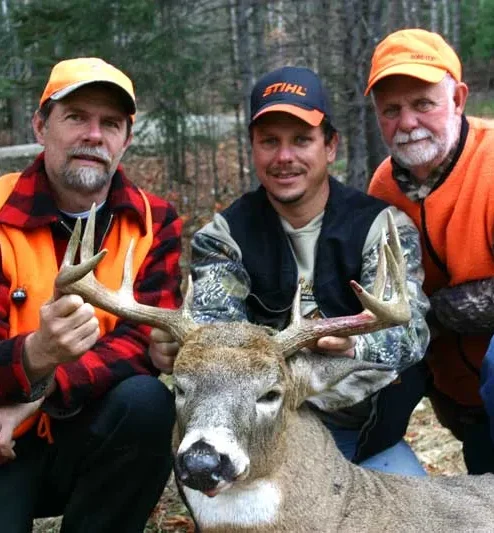 Seaman Family and Maine Hunting Guide Jim Yearwood and harvested whitetail deer.